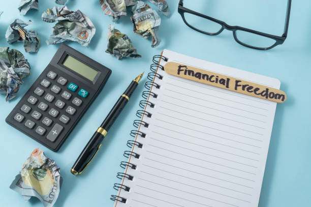 istock Conceptual image of dollar banknote with a text Financial Freedom 2188041269