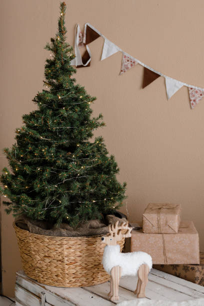 istock Christmas tree and deer figurine 2188043686