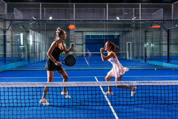 istock Two female padel teammates celebrating a point 2188049679
