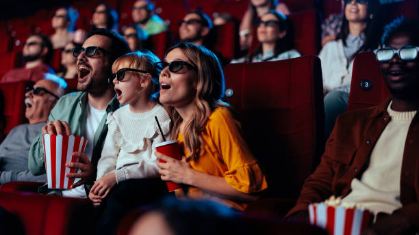 istock Family watching 3D movie. 2188050357