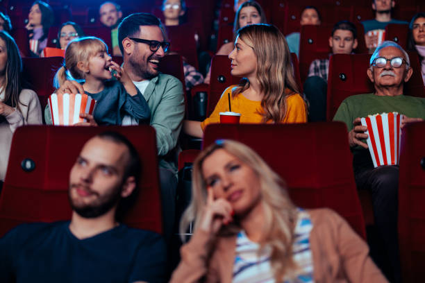 istock Young parents with child in cinema. 2188050361