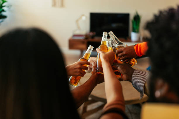 istock Close up of people toasting with beer. 2188050817