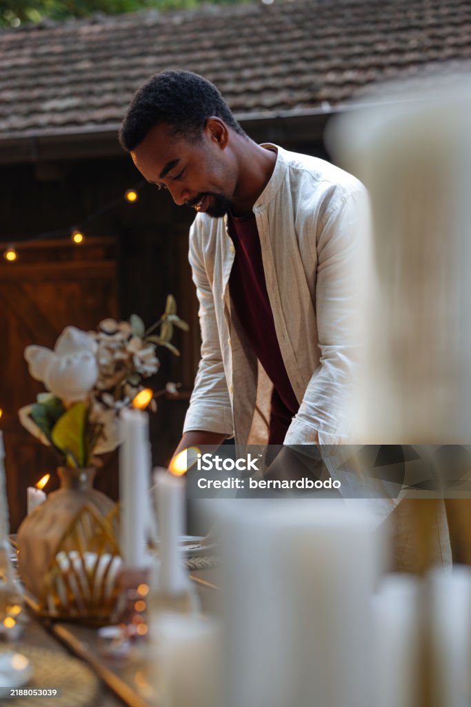 Guy Setting Table Handsome Black Man Setting A Table For A Dinner Party Stock Photo ...
