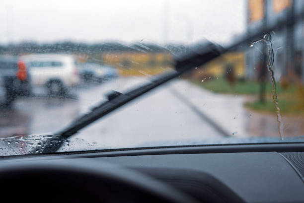 istock wiper across the wet windscreen 2188054384