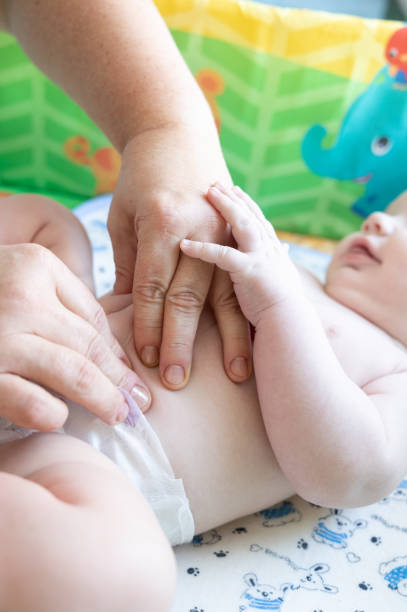 istock Gentle Baby Tummy Massage for Comfort. 2188057088