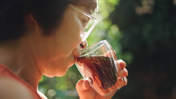 istock Woman drinking coffee at nature. 2188058601