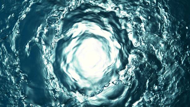 istock Texture of splashing water surface, top shot, tunnel shape. 2188059341