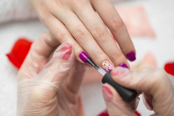 istock Manicure nail paint pink color 2188062304