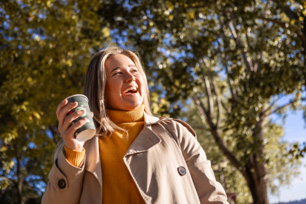 istock Woman Enjoying a Warm Drink 2188066545