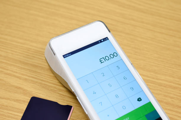 istock Making a card payment on a contactless pdq machine with a credit or debit card 2188067589