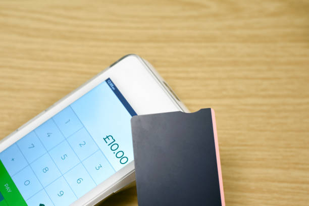 istock Making a card payment on a contactless pdq machine with a credit or debit card 2188067617