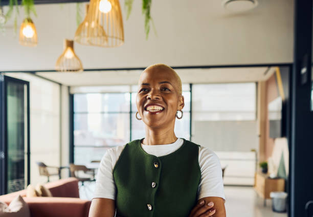 istock Confident senior software engineer smiling in modern office: ai specialist leading innovation 2188069573