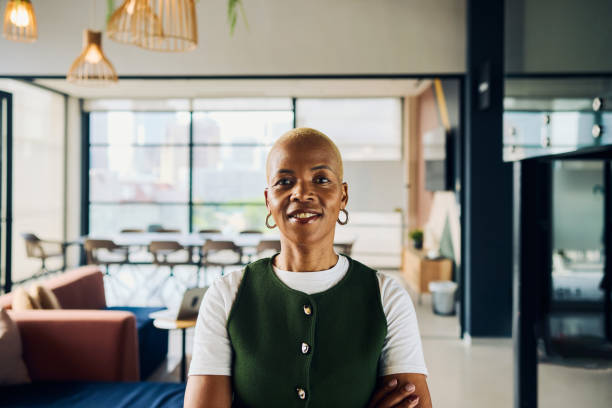 istock Confident senior software engineer smiling in modern office: ai specialist leading innovation 2188069575