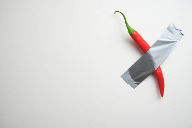 Red Chili Pepper Taped to Wall.
