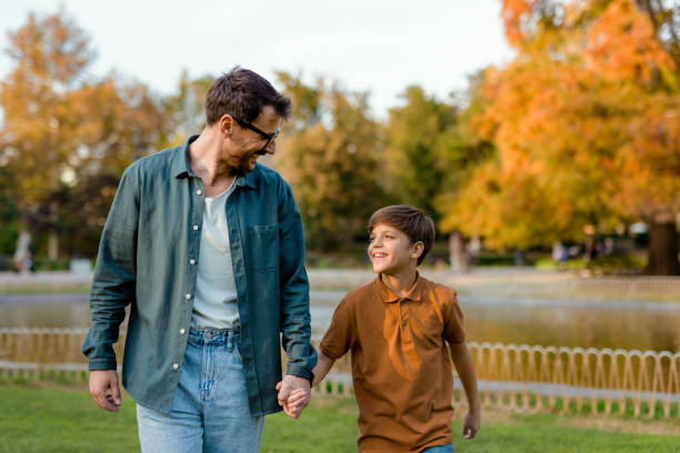 istock Happy Family Time: Father and Son in the City Park 2188083121