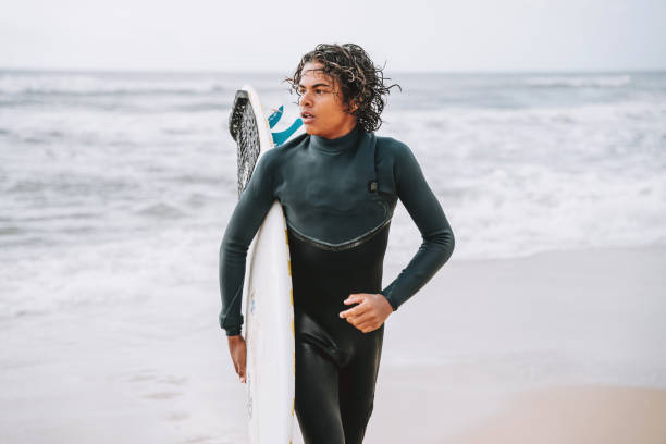 Portrait of a young surfer boy