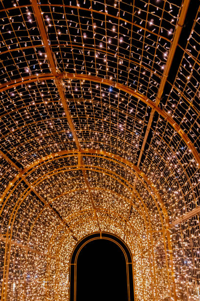 istock Play of Light and Space: A glowing tunnel where the lights form a symmetrical pattern, highlighting the architectural lines. 2188091090