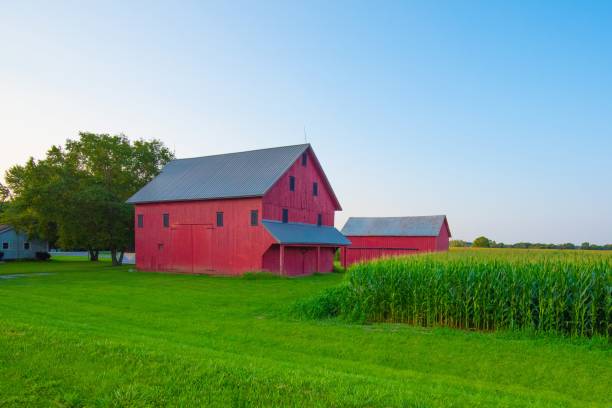 istock Red Barn at sunrise with corn field-Hamilton County, Indiana 2188097961