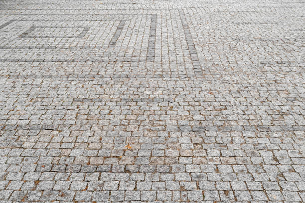 istock Cobblestone pavement. The sidewalk is lined with cobblestones 2188098679