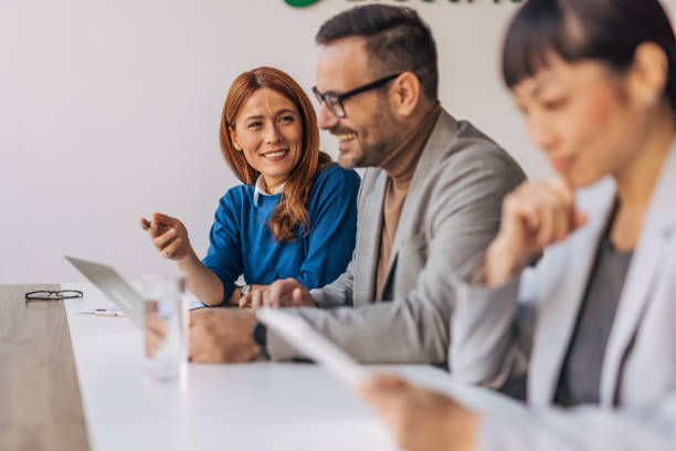 istock Multiethnic businesspeople working together in the office 2188098857