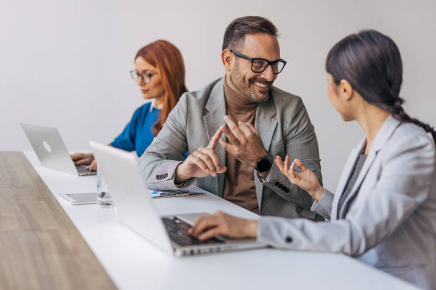 istock Achieving success by getting the job done through teamwork. 2188100465