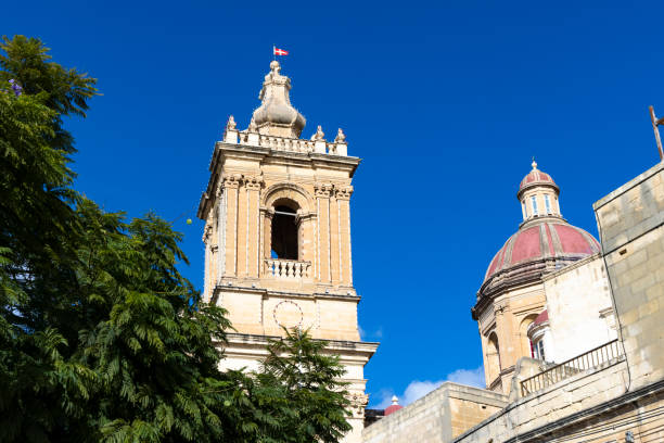 A picturesque view of Birgu, one of Malta’s historic Three Cities, renowned for its impressive fort, vibrant marina, and scenic waterfront.