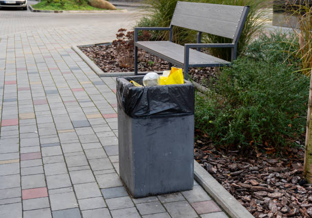 istock Container overflowing with waste. Garbage bin on the street in a recreation area 2188104773