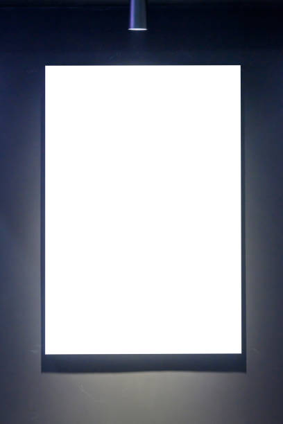 istock billboard or promotional poster with white interior isolated under spotlight 2188108786