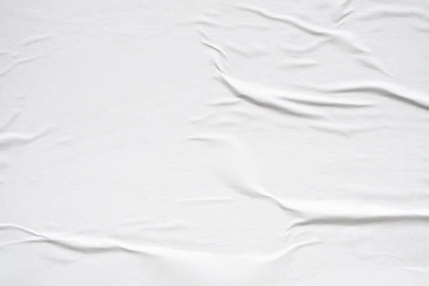 istock White blank crumpled and creased paper poster texture background 2188112155
