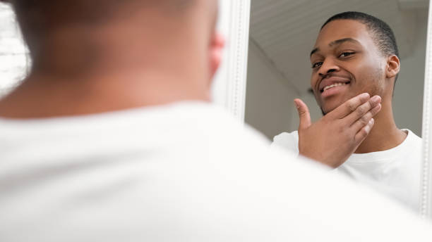 istock Skin routine facial care man touching face stubble 2188113790