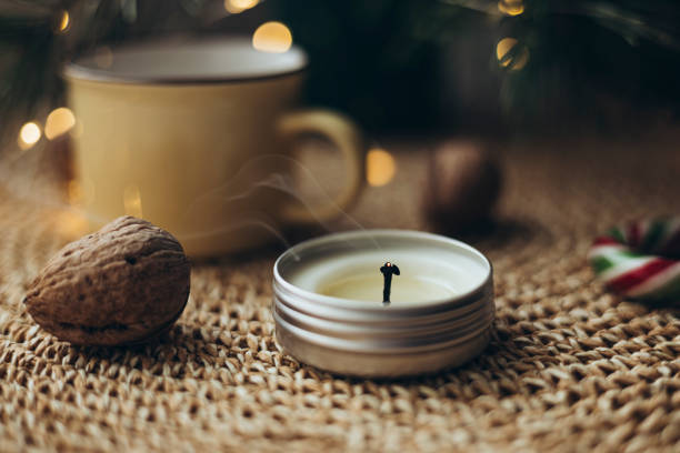 istock Christmas cozy home background with candle and cup on windowsill, copy space. 2188126247