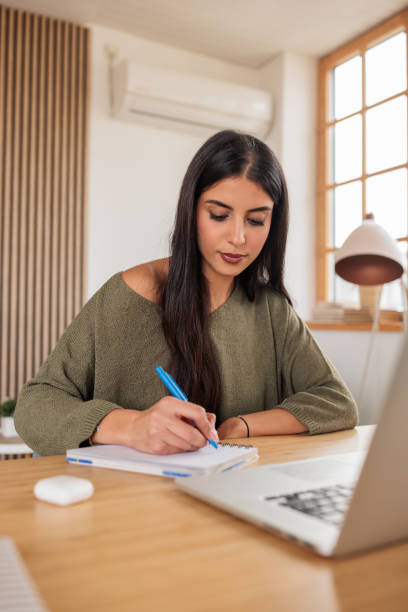 istock Woman Learning New Skills via Online Course 2188127629