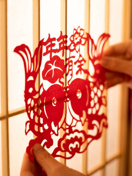 istock Cutting and pasting window decorations during the Spring Festival 2188127959