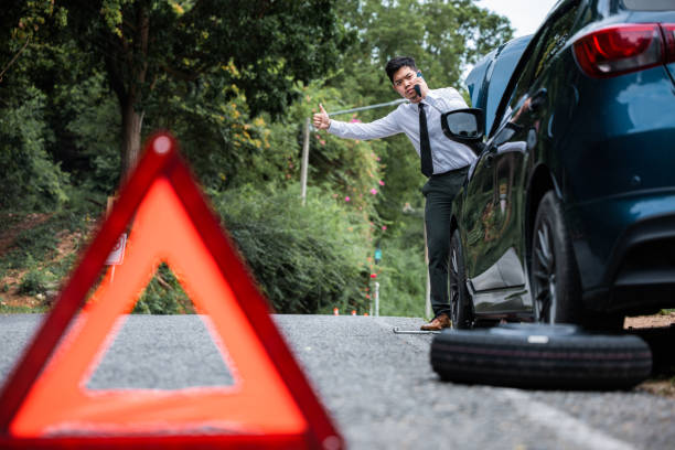 istock Businessman call with phone and red warning triangle. 2188128391