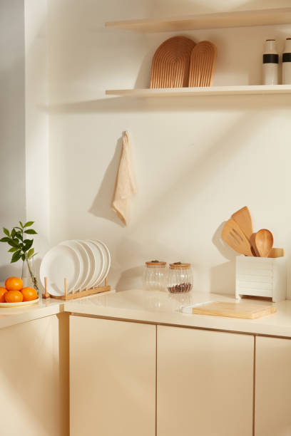 istock Peaceful kitchen corner in minimalist style, decorated by elegant contemporary kitchen interior and utensils. Presentation and copy space 2188130161