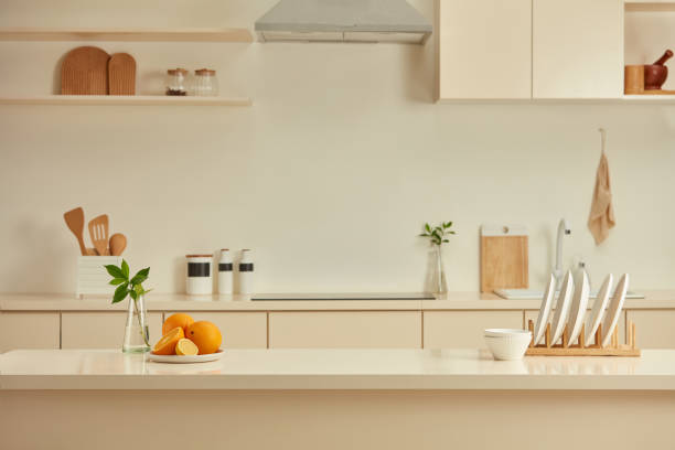 Kitchen layout photography with a wooden kitchen island, kitchen counter and some other convenient kitchen interior in morning. Photo for product displaying or design key visual layout