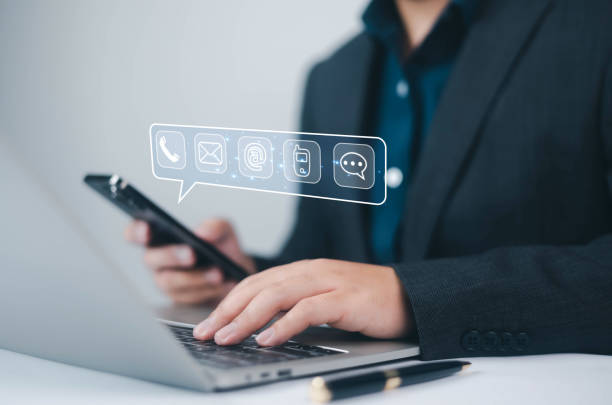 contact customer support. businessman use smartphone select an icon (address, phone, email, call) help from mail websites. mobile communication contact service digital technology, provide assistance - e mail fotos stockfoto's en -beelden