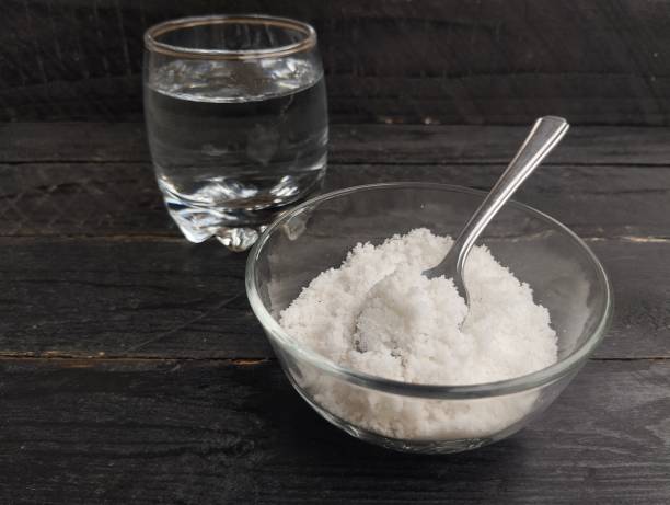 istock A glass of salt water solution on wooden table 2188135860
