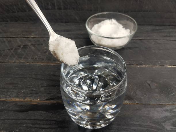 istock A glass of salt water solution on wooden table 2188135888