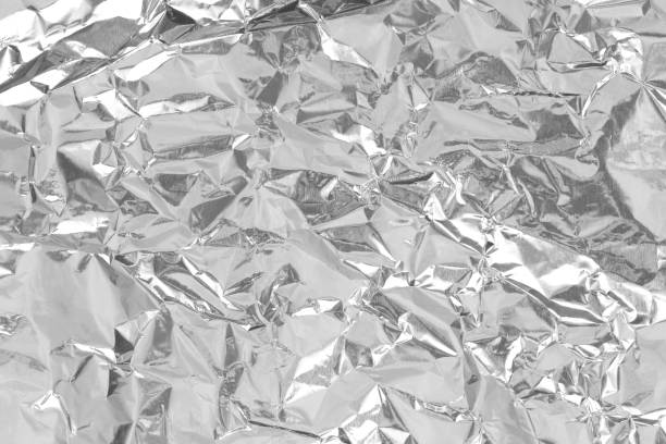 istock Silver foil leaf shiny texture, abstract grey wrapping paper for background and design art work. 2188138148