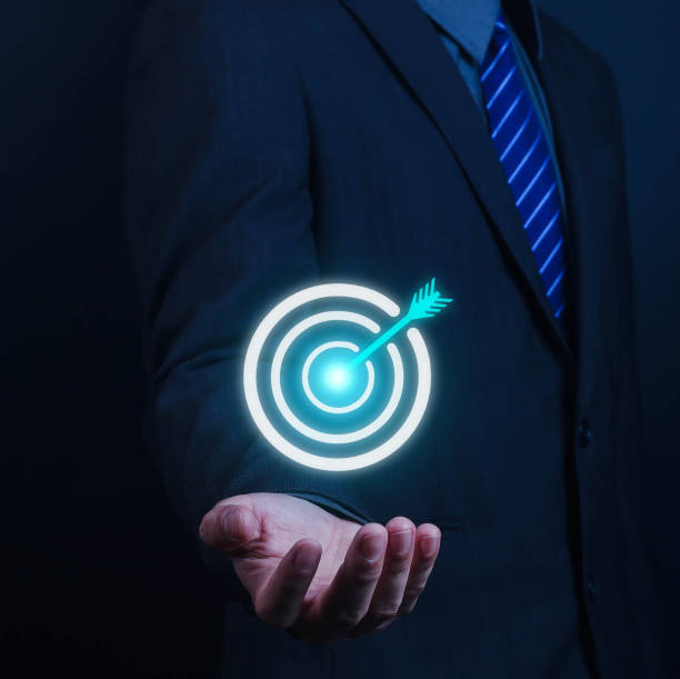 istock Business goal setting concept. Businessman holding virtual target icon for business purpose. Strategic planning for business growth. Marketing strategy and goal for success. 2188139021