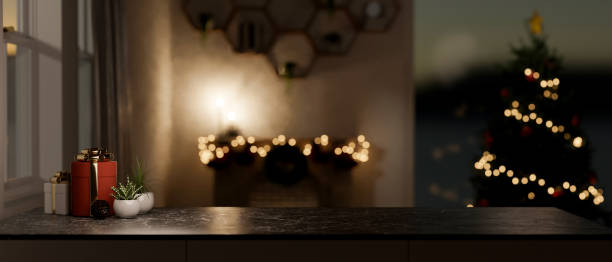 istock Copy space for product display on a black marble tabletop in a cozy room on a festive night. 2188141324