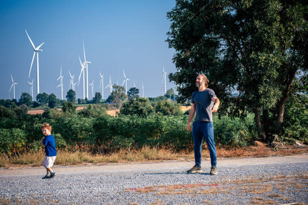 istock Father and son flying a kite 2188143022