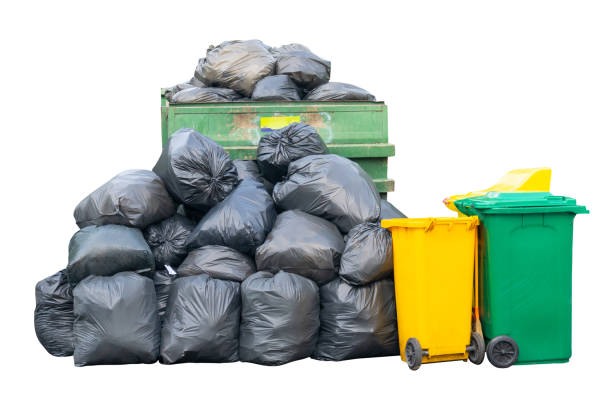 istock Front view of giant stack of garbage dump in black plastic bag with wheeled plastic bin or can isolated on white background with clipping path 2188143403