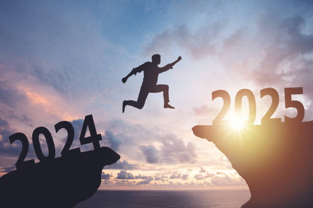istock Silhouette of a man jumping from cliff to cliff 2188144888