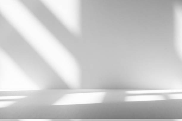istock Wall interior background, studio and backdrops show products.with shadow from window color white . background for text insertion and presentation product 2188145871