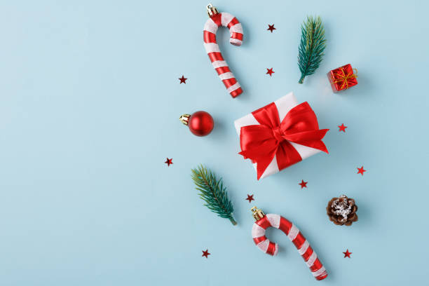 istock Christmas gift with decoration on blue background 2188146753