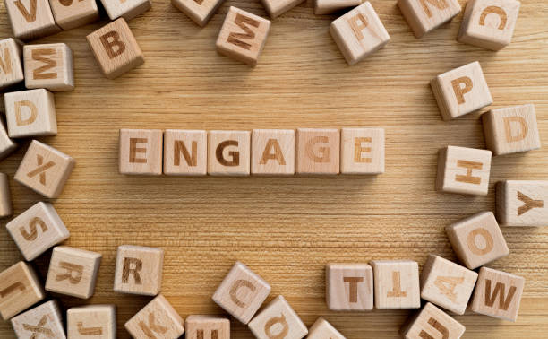 istock Wooden blocks with word engage on the table 2188151142