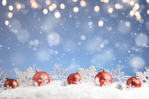 istock Christmas balls and snowflake with snow on color background 2188154071