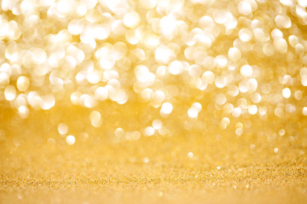 istock Abstract glitter golden background with copy space 2188154184